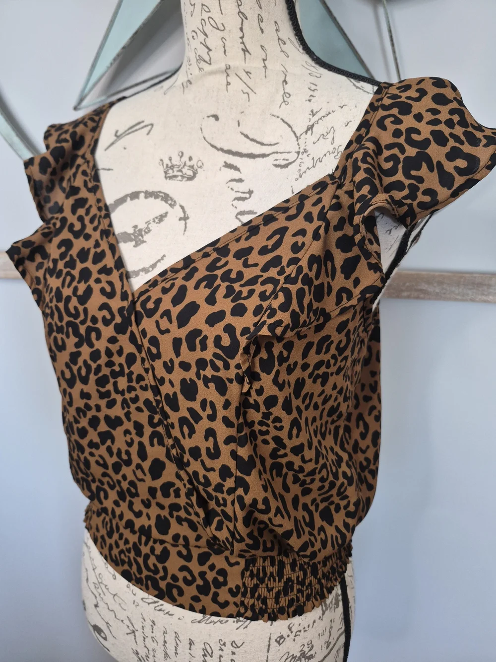 Sienna Sky Brown and Black Leopard Ruffle Sleeve Faux Wrap Smocked Hem Top - S
